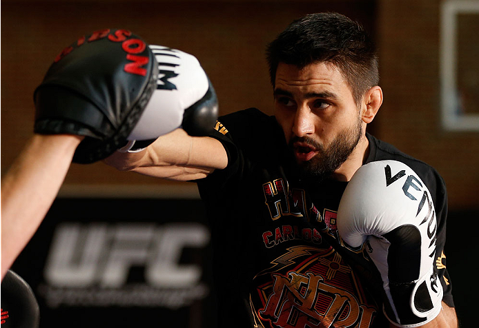 INDIANAPOLIS, IN - AUGUST 26: Carlos Condit holds an open training session for fans and media at Banker's Life Fieldhouse on August 26, 2013 in Indianapolis, Indiana. (Photo by Josh Hedges/Zuffa LLC/Zuffa LLC via Getty Images)