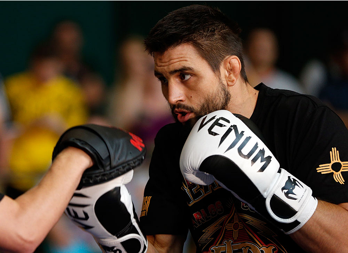INDIANAPOLIS, IN - AUGUST 26: Carlos Condit holds an open training session for fans and media at Banker's Life Fieldhouse on August 26, 2013 in Indianapolis, Indiana. (Photo by Josh Hedges/Zuffa LLC/Zuffa LLC via Getty Images)