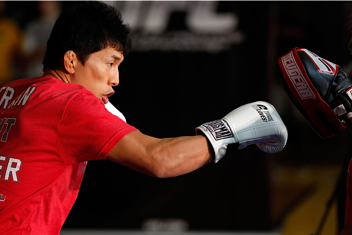 INDIANAPOLIS, IN - AUGUST 26: Takeya Mizugaki holds an open training session for fans and media at Banker's Life Fieldhouse on August 26, 2013 in Indianapolis, Indiana. (Photo by Josh Hedges/Zuffa LLC/Zuffa LLC via Getty Images)