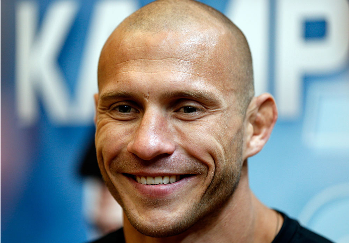 INDIANAPOLIS, IN - AUGUST 26: Donald "Cowboy" Cerrone interacts with media at Banker's Life Fieldhouse on August 26, 2013 in Indianapolis, Indiana. (Photo by Josh Hedges/Zuffa LLC/Zuffa LLC via Getty Images)