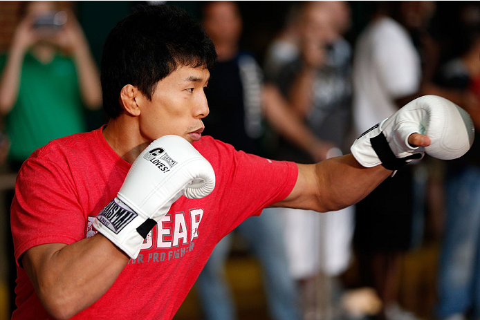 INDIANAPOLIS, IN - AUGUST 26: Takeya Mizugaki holds an open training session for fans and media at Banker's Life Fieldhouse on August 26, 2013 in Indianapolis, Indiana. (Photo by Josh Hedges/Zuffa LLC/Zuffa LLC via Getty Images)