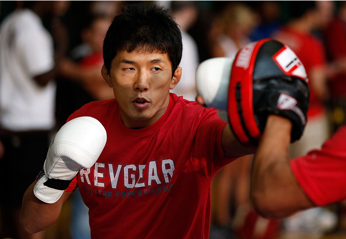 INDIANAPOLIS, IN - AUGUST 26: Takeya Mizugaki holds an open training session for fans and media at Banker's Life Fieldhouse on August 26, 2013 in Indianapolis, Indiana. (Photo by Josh Hedges/Zuffa LLC/Zuffa LLC via Getty Images)