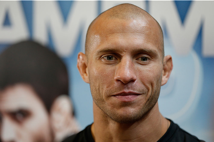 INDIANAPOLIS, IN - AUGUST 26: Donald "Cowboy" Cerrone interacts with media at Banker's Life Fieldhouse on August 26, 2013 in Indianapolis, Indiana. (Photo by Josh Hedges/Zuffa LLC/Zuffa LLC via Getty Images)