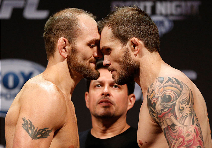 INDIANAPOLIS, IN - AUGUST 27: (L-R) Opponents Zak Cummings and Benny Alloway face off during the UFC weigh-in event at Bankers Life Fieldhouse on August 27, 2013 in Indianapolis, Indiana. (Photo by Josh Hedges/Zuffa LLC/Zuffa LLC via Getty Images)
