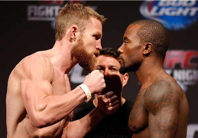 INDIANAPOLIS, IN - AUGUST 27: (L-R) Opponents James Head and Jason High face off during the UFC weigh-in event at Bankers Life Fieldhouse on August 27, 2013 in Indianapolis, Indiana. (Photo by Josh Hedges/Zuffa LLC/Zuffa LLC via Getty Images)