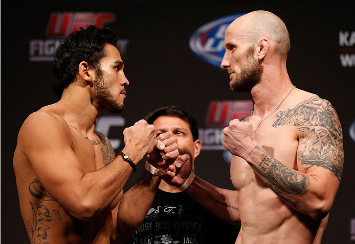 INDIANAPOLIS, IN - AUGUST 27: (L-R) Opponents Brad Tavares and Bubba McDaniel face off during the UFC weigh-in event at Bankers Life Fieldhouse on August 27, 2013 in Indianapolis, Indiana. (Photo by Josh Hedges/Zuffa LLC/Zuffa LLC via Getty Images)