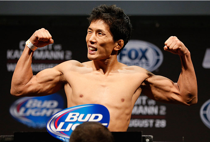 INDIANAPOLIS, IN - AUGUST 27: Takeya Mizugaki weighs in during the UFC weigh-in event at Bankers Life Fieldhouse on August 27, 2013 in Indianapolis, Indiana. (Photo by Josh Hedges/Zuffa LLC/Zuffa LLC via Getty Images)