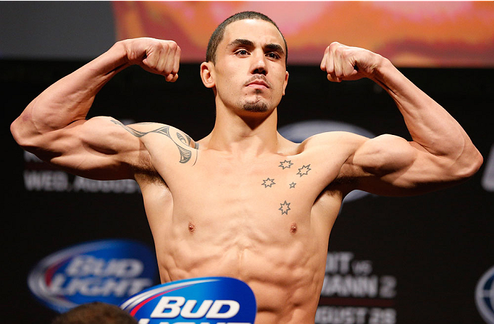 INDIANAPOLIS, IN - AUGUST 27: Robert Whittaker weighs in during the UFC weigh-in event at Bankers Life Fieldhouse on August 27, 2013 in Indianapolis, Indiana. (Photo by Josh Hedges/Zuffa LLC/Zuffa LLC via Getty Images)