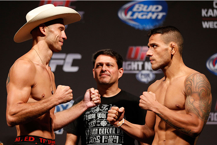 INDIANAPOLIS, IN - AUGUST 27: (L-R) Opponents Donald "Cowboy" Cerrone and Rafael dos Anjos face off during the UFC weigh-in event at Bankers Life Fieldhouse on August 27, 2013 in Indianapolis, Indiana. (Photo by Josh Hedges/Zuffa LLC/Zuffa LLC via Getty
