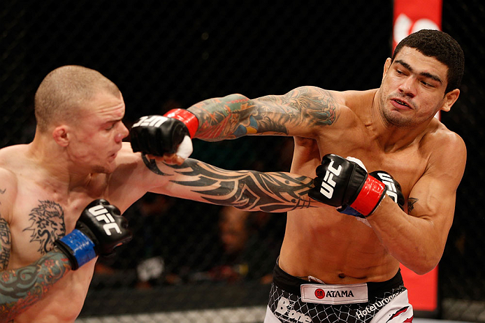 FORTALEZA, BRAZIL - JUNE 08: (R-L) Antonio Braga Neto punches Anthony Smith in their middleweight fight during the UFC on FUEL TV event at Paulo Sarasate Arena on June 8, 2013 in Fortaleza, Ceara, Brazil. (Photo by Josh Hedges/Zuffa LLC/Zuffa LLC via Ge