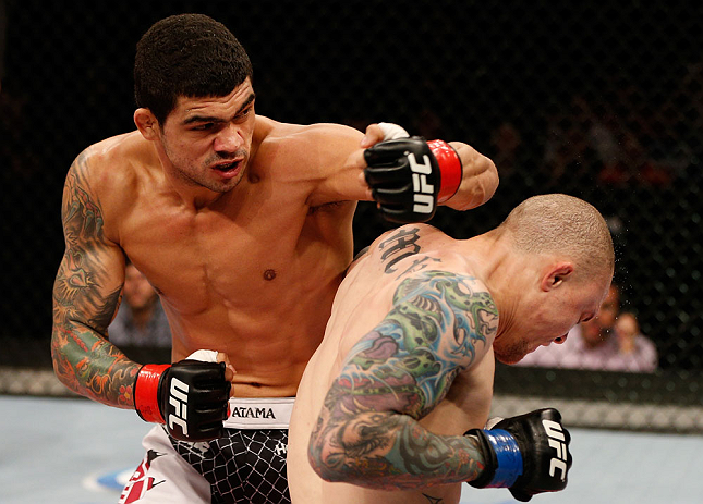 FORTALEZA, BRAZIL - JUNE 08: (L-R) Antonio Braga Neto punches Anthony Smith in their middleweight fight during the UFC on FUEL TV event at Paulo Sarasate Arena on June 8, 2013 in Fortaleza, Ceara, Brazil. (Photo by Josh Hedges/Zuffa LLC/Zuffa LLC via Ge
