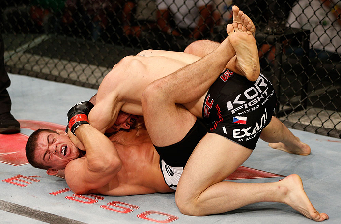 FORTALEZA, BRAZIL - JUNE 08: (R-L) Karlos Vemola elbows Caio Magalhaes in their middleweight fight during the UFC on FUEL TV event at Paulo Sarasate Arena on June 8, 2013 in Fortaleza, Ceara, Brazil. (Photo by Josh Hedges/Zuffa LLC/Zuffa LLC via Getty I