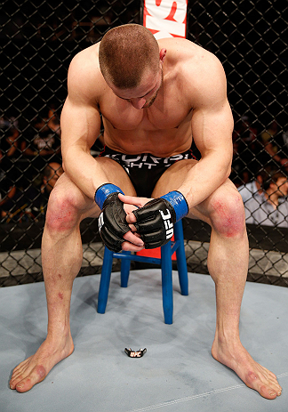 FORTALEZA, BRAZIL - JUNE 08: A dejected Karlos Vemola sits on his stool after his submission loss to Caio Magalhaes in their middleweight fight during the UFC on FUEL TV event at Paulo Sarasate Arena on June 8, 2013 in Fortaleza, Ceara, Brazil. (Photo b