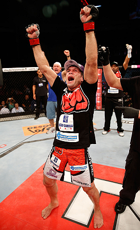 FORTALEZA, BRAZIL - JUNE 08: Rodrigo Damm reacts after his split decision victory over Mizuto Hirota in their featherweight fight during the UFC on FUEL TV event at Paulo Sarasate Arena on June 8, 2013 in Fortaleza, Ceara, Brazil. (Photo by Josh Hedges/