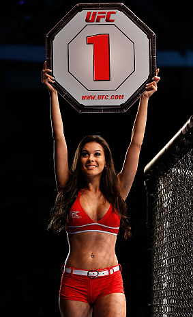 FORTALEZA, BRAZIL - JUNE 08: UFC Octagon Girl Camila Rodrigues de Oliveira introduces a round during the UFC on FUEL TV event at Paulo Sarasate Arena on June 8, 2013 in Fortaleza, Ceara, Brazil. (Photo by Josh Hedges/Zuffa LLC/Zuffa LLC via Getty Images