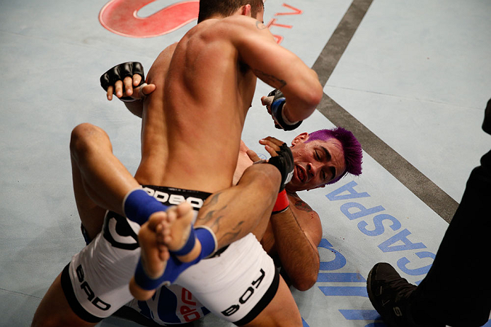 FORTALEZA, BRAZIL - JUNE 08: Felipe Arantes (top) elbows Godofredo "Pepey" Castro in their featherweight fight during the UFC on FUEL TV event at Paulo Sarasate Arena on June 8, 2013 in Fortaleza, Ceara, Brazil. (Photo by Josh Hedges/Zuffa LLC/Zuffa LLC