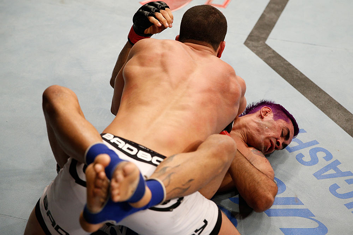 FORTALEZA, BRAZIL - JUNE 08: Felipe Arantes (top) elbows Godofredo "Pepey" Castro in their featherweight fight during the UFC on FUEL TV event at Paulo Sarasate Arena on June 8, 2013 in Fortaleza, Ceara, Brazil. (Photo by Josh Hedges/Zuffa LLC/Zuffa LLC