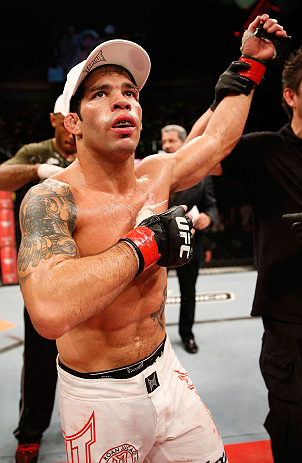 FORTALEZA, BRAZIL - JUNE 08: Raphael Assuncao reacts after his submission victory over Vaughan Lee in their bantamweight fight during the UFC on FUEL TV event at Paulo Sarasate Arena on June 8, 2013 in Fortaleza, Ceara, Brazil. (Photo by Josh Hedges/Zuf