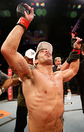 FORTALEZA, BRAZIL - JUNE 08: Raphael Assuncao reacts after his submission victory over Vaughan Lee in their bantamweight fight during the UFC on FUEL TV event at Paulo Sarasate Arena on June 8, 2013 in Fortaleza, Ceara, Brazil. (Photo by Josh Hedges/Zuf