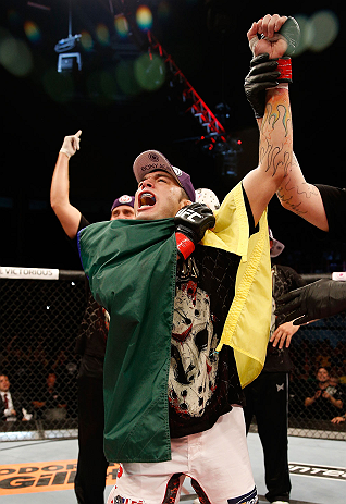 FORTALEZA, BRAZIL - JUNE 08: Rony "Jason" Mariano Bezerra reacts after defeating Mike Wilkinson in their featherweight fight during the UFC on FUEL TV event at Paulo Sarasate Arena on June 8, 2013 in Fortaleza, Ceara, Brazil. (Photo by Josh Hedges/Zuffa
