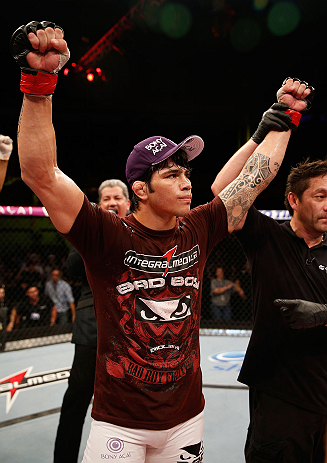 FORTALEZA, BRAZIL - JUNE 08: Erick Silva reacts after defeating Jason High in their welterweight fight during the UFC on FUEL TV event at Paulo Sarasate Arena on June 8, 2013 in Fortaleza, Ceara, Brazil. (Photo by Josh Hedges/Zuffa LLC/Zuffa LLC via Get