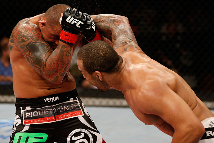 FORTALEZA, BRAZIL - JUNE 08: (R-L) Rafael "Feijao" Cavalcante punches Thiago Silva in their light heavyweight fight during the UFC on FUEL TV event at Paulo Sarasate Arena on June 8, 2013 in Fortaleza, Ceara, Brazil. (Photo by Josh Hedges/Zuffa LLC/Zuff