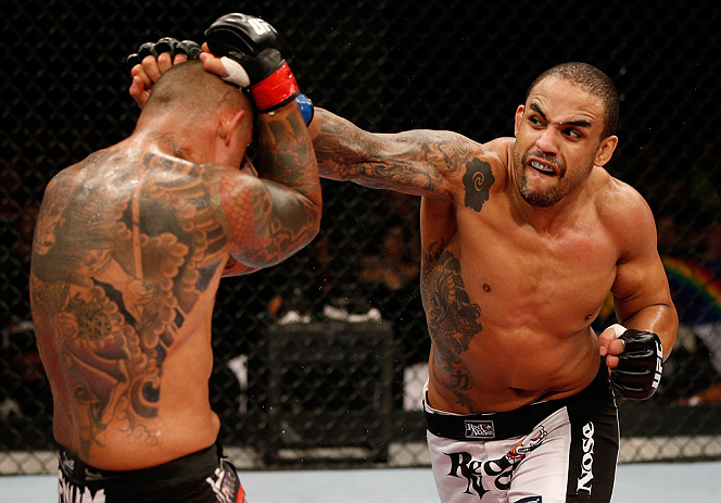 FORTALEZA, BRAZIL - JUNE 08: (R-L) Rafael "Feijao" Cavalcante punches Thiago Silva in their light heavyweight fight during the UFC on FUEL TV event at Paulo Sarasate Arena on June 8, 2013 in Fortaleza, Ceara, Brazil. (Photo by Josh Hedges/Zuffa LLC/Zuff
