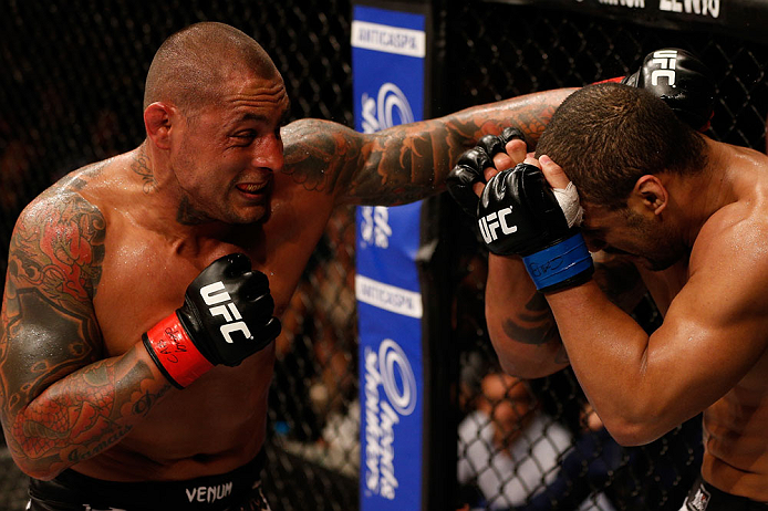 FORTALEZA, BRAZIL - JUNE 08: (L-R) Thiago Silva punches Rafael "Feijao" Cavalcante in their light heavyweight fight during the UFC on FUEL TV event at Paulo Sarasate Arena on June 8, 2013 in Fortaleza, Ceara, Brazil. (Photo by Josh Hedges/Zuffa LLC/Zuff