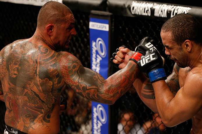 FORTALEZA, BRAZIL - JUNE 08: (L-R) Thiago Silva punches Rafael "Feijao" Cavalcante in their light heavyweight fight during the UFC on FUEL TV event at Paulo Sarasate Arena on June 8, 2013 in Fortaleza, Ceara, Brazil. (Photo by Josh Hedges/Zuffa LLC/Zuff