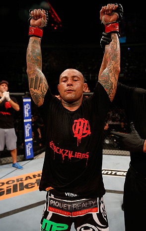 FORTALEZA, BRAZIL - JUNE 08: Thiago Silva reacts after knocking out Rafael "Feijao" Cavalcante in their light heavyweight fight during the UFC on FUEL TV event at Paulo Sarasate Arena on June 8, 2013 in Fortaleza, Ceara, Brazil. (Photo by Josh Hedges/Zu