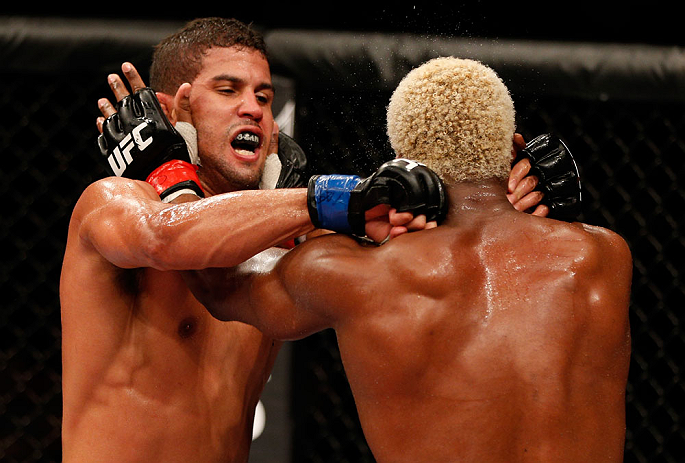 FORTALEZA, BRAZIL - JUNE 08: (L-R) Leonardo Santos punches William "Patolino" Macario in their welterweight fight during the UFC on FUEL TV event at Paulo Sarasate Arena on June 8, 2013 in Fortaleza, Ceara, Brazil. (Photo by Josh Hedges/Zuffa LLC/Zuffa