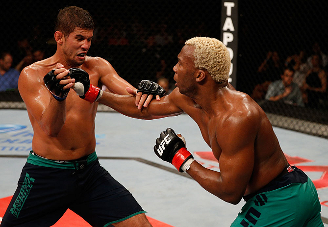 FORTALEZA, BRAZIL - JUNE 08: (R-L) William "Patolino" Macario punches Leonardo Santos in their welterweight fight during the UFC on FUEL TV event at Paulo Sarasate Arena on June 8, 2013 in Fortaleza, Ceara, Brazil. (Photo by Josh Hedges/Zuffa LLC/Zuffa