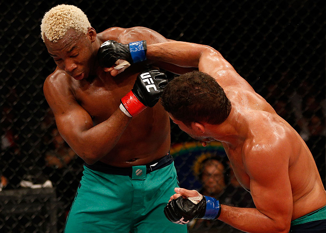 FORTALEZA, BRAZIL - JUNE 08: (R-L) Leonardo Santos punches William "Patolino" Macario in their welterweight fight during the UFC on FUEL TV event at Paulo Sarasate Arena on June 8, 2013 in Fortaleza, Ceara, Brazil. (Photo by Josh Hedges/Zuffa LLC/Zuffa