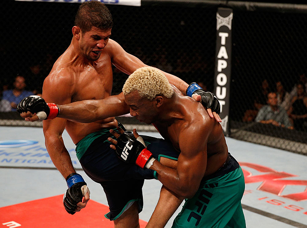 FORTALEZA, BRAZIL - JUNE 08: (L-R) Leonardo Santos knees William "Patolino" Macario in their welterweight fight during the UFC on FUEL TV event at Paulo Sarasate Arena on June 8, 2013 in Fortaleza, Ceara, Brazil. (Photo by Josh Hedges/Zuffa LLC/Zuffa LL