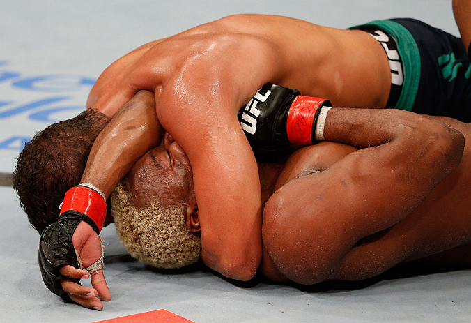 FORTALEZA, BRAZIL - JUNE 08: (L-R) Leonardo Santos defeats William "Patolino" Macario with an arm triangle submission in their welterweight fight during the UFC on FUEL TV event at Paulo Sarasate Arena on June 8, 2013 in Fortaleza, Ceara, Brazil. (Photo