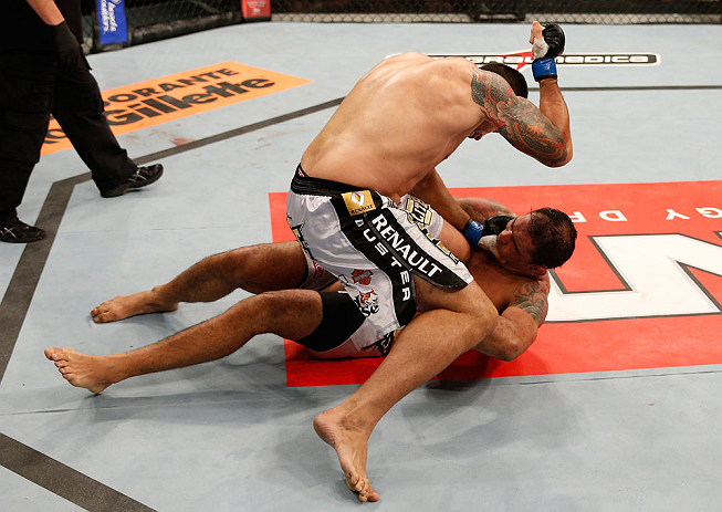 FORTALEZA, BRAZIL - JUNE 08: (L-R) Fabricio Werdum punches Antonio Rodrigo "Minotauro" Nogueira in their heavyweight fight during the UFC on FUEL TV event at Paulo Sarasate Arena on June 8, 2013 in Fortaleza, Ceara, Brazil. (Photo by Josh Hedges/Zuffa L