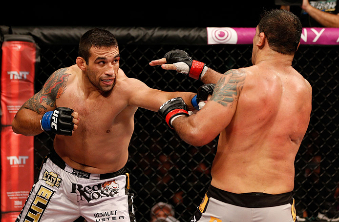 FORTALEZA, BRAZIL - JUNE 08: (L-R) Fabricio Werdum punches Antonio Rodrigo "Minotauro" Nogueira in their heavyweight fight during the UFC on FUEL TV event at Paulo Sarasate Arena on June 8, 2013 in Fortaleza, Ceara, Brazil. (Photo by Josh Hedges/Zuffa L