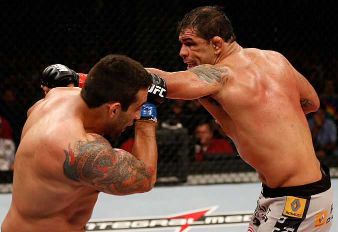 FORTALEZA, BRAZIL - JUNE 08: (R-L) Antonio Rodrigo "Minotauro" Nogueira punches Fabricio Werdum in their heavyweight fight during the UFC on FUEL TV event at Paulo Sarasate Arena on June 8, 2013 in Fortaleza, Ceara, Brazil. (Photo by Josh Hedges/Zuffa L