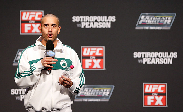 GOLD COAST, AUSTRALIA - DECEMBER 14: UFC host Jon Anik interacts with fans during a Q&A session before the UFC on FX weigh in on December 14, 2012 at Gold Coast Convention and Exhibition Centre in Gold Coast, Queensland, Australia. (Photo by Josh Hedges