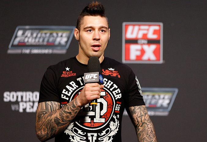 GOLD COAST, AUSTRALIA - DECEMBER 14: UFC welterweight fighter Dan Hardy interacts with fans during a Q&A session before the UFC on FX weigh in on December 14, 2012 at Gold Coast Convention and Exhibition Centre in Gold Coast, Queensland, Australia. (Pho