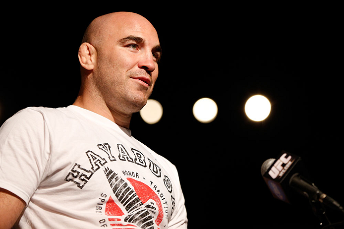 GOLD COAST, AUSTRALIA - DECEMBER 14: Fellow UFC fighter Brian Ebersole asks a question of Dan Hardy during a Q&A session before the UFC on FX weigh in on December 14, 2012 at Gold Coast Convention and Exhibition Centre in Gold Coast, Queensland, Australi