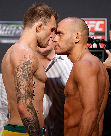 GOLD COAST, AUSTRALIA - DECEMBER 14: (L-R) Opponents Benny Alloway and Manuel Rodriguez face off during the UFC on FX weigh in on December 14, 2012 at Gold Coast Convention and Exhibition Centre in Gold Coast, Queensland, Australia. (Photo by Josh Hedge