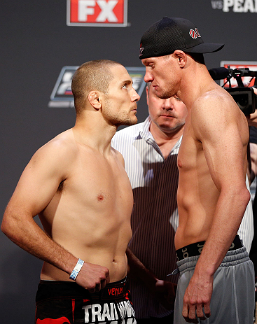 GOLD COAST, AUSTRALIA - DECEMBER 14: (L-R) Opponents Mike Pierce and Seth Baczynski face off during the UFC on FX weigh in on December 14, 2012 at Gold Coast Convention and Exhibition Centre in Gold Coast, Queensland, Australia. (Photo by Josh Hedges/Zu