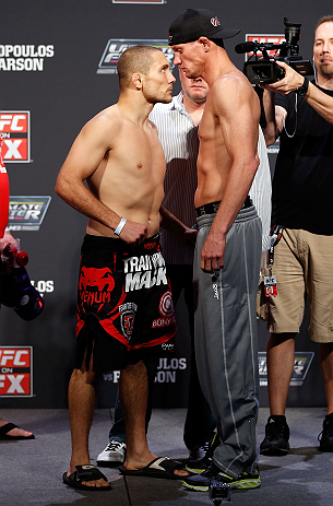 GOLD COAST, AUSTRALIA - DECEMBER 14: (L-R) Opponents Mike Pierce and Seth Baczynski face off during the UFC on FX weigh in on December 14, 2012 at Gold Coast Convention and Exhibition Centre in Gold Coast, Queensland, Australia. (Photo by Josh Hedges/Zu
