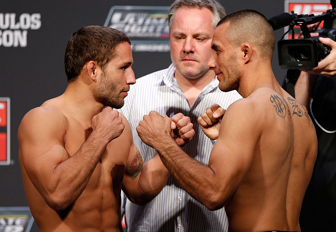 GOLD COAST, AUSTRALIA - DECEMBER 14: (L-R) Opponents Chad Mendes and Yaotzin Meza face off during the UFC on FX weigh in on December 14, 2012 at Gold Coast Convention and Exhibition Centre in Gold Coast, Queensland, Australia. (Photo by Josh Hedges/Zuff