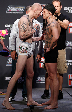 GOLD COAST, AUSTRALIA - DECEMBER 14: (L-R) Opponents Colin Fletcher and Norman Parke face off during the UFC on FX weigh in on December 14, 2012 at Gold Coast Convention and Exhibition Centre in Gold Coast, Queensland, Australia. (Photo by Josh Hedges/Z