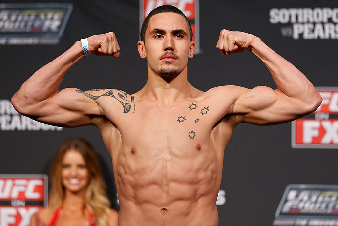 GOLD COAST, AUSTRALIA - DECEMBER 14: Robert Whittaker weighs in during the UFC on FX weigh in on December 14, 2012 at Gold Coast Convention and Exhibition Centre in Gold Coast, Queensland, Australia. (Photo by Josh Hedges/Zuffa LLC/Zuffa LLC via Getty I