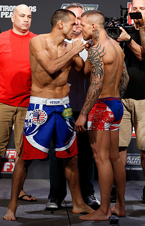 GOLD COAST, AUSTRALIA - DECEMBER 14: (L-R) Opponents George Sotiropoulos and Ross Pearson face off during the UFC on FX weigh in on December 14, 2012 at Gold Coast Convention and Exhibition Centre in Gold Coast, Queensland, Australia. (Photo by Josh Hed