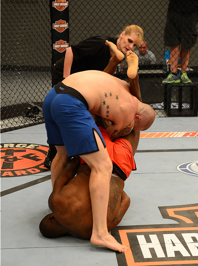 LAS VEGAS, NV - OCTOBER 16: (L-R) Todd Monaghan submits Jake Helin in their elimination fight during filming of season nineteen of The Ultimate Fighter on October 16, 2013 in Las Vegas, Nevada. (Photo by Al Powers/Zuffa LLC/Zuffa LLC via Getty Images) **