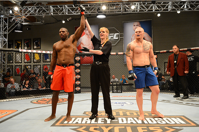 LAS VEGAS, NV - OCTOBER 16: (L-R) Todd Monaghan celebrates after submitting Jake Helin in their elimination fight during filming of season nineteen of The Ultimate Fighter on October 16, 2013 in Las Vegas, Nevada. (Photo by Al Powers/Zuffa LLC/Zuffa LLC